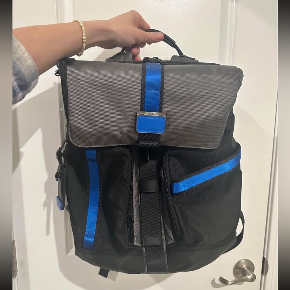 - Brand new never used Tumi